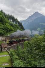 Dampflok-Spektakel am Gotthard - das offiziell letzte Mal Dampf an der Gotthard-Bergstrecke. Am 27. Juni 2015 fuhren die 141R 1244, die 01 202, und die 01 150 ins Tessin. Hier die 01 202 und die 01 150 zwischen Amsteg und Intschi mit der Chli Windgällen im Hintergrund. 