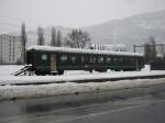 Der Komfortstreien EWII 50 85 20-34 588-7 steht seit einiger Zeit abgestellt in Sion, bei Einfahrt seite Brig, 21.12.2011.