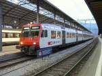 SBB - Der Steuerwagen Bt 50 85 29-35 971-5 als zusatz vor einem NPZ Pendelzug im Bahnhof von Olten am 08.04.2009 morgens um 07.05 Uhr