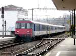 SBB - Schnellzug Bern - Biel / Bienne ( Statt mit Doppelstockwagen )mit Ersatzzug BDt + B + B + B + AB + Re 4/4 11206 bei der einfahrt in den Bahnhof von Lyss am 02.03.2008