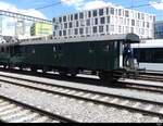 SBB - Historischer Gepäckwagen F  18275 unterwegs in Brugg mit einem Dampfzug am 2024.05.18 