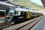 Domino RA14 von RegionAlps mit der neuen Kanal 9 Werbung am 27.7.22 im Bahnhof Visp.