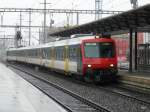 SBB - Einfahrender Regionalzug mit dem Steuerwagen Bt 50 85 29-35 934-3 an der Spitze im Bahnhof Aarau am 23.07.2010