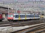 SBB - Einfahrender Regio mit dem Steuerwagen Bt 50 85 29-34 979-9 und Triebwagen RBDe 4/4 560 012-7 im Bahnhof Olten am 31.10.2010