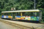 SBB Brnig - Salonwagen A 101 mit Bunter Kinderbemalung im Bahnhof Interlaken Ost im Juni 1985