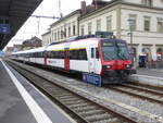 SBB - Steuerwagen ABt 50 85 39-43 836-8 an der Spitze eines Regio nach Fribourg im Bahnhof von Payerne am 10.02.2018