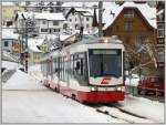 Be 4/6 35 der S12 nach St.Gallen im verschneiten Trogen.