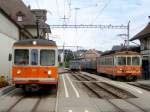 asm - Be 4/4 101 bei Probefahrt neben dem einfahrendem Kieszug mit Be 4/4 523 im Bahnhof von Tuffelen am 22.07.2008