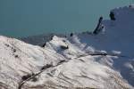 BRB-Dampfzug 3. Generation talwrts fahrend in der Rampe am Dirrengrind. Oben der Brienzer See und Teile von Brienz, 23. Okt. 2011, 16:42