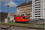 Die CJ Gem 2/2 521 verlässt La Chaux-de-Fonds in Richtung Le Noirmont.