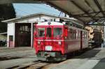 BDe 4/4  641 (ex RhB) mit schwerem Holz - Gterzug bei der Durchfahrt im Bahnhof Tramelan am 02.05.2006