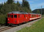 CJ: Regionalzug mit dem Gtertriebwagen De 4/4 411 bei Tramlan am 21. September 2013.
Foto: Walter Ruetsch