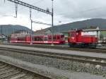 CJ - GTW ABe 2/6 633 und Tm 2/2  231 180-1 im Bahnhofsareal von Glovelier am 31.08.2014