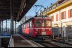 ABe 4/4 641 (ex RhB Chur-Arosa ABe 4/4 487) steht am 22. Dezember 2015 im Bahnhof La Chaux-de-Fonds mit einem Kehrichtzug bereit zur Abfahrt.