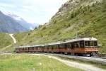 MGB GGB - Regionalzug 30 von Gornergrat nach Zermatt am 29.06.2007 bei Riffelboden mit Bhe 4/8 3052 + Bhe 4/8 3054- Hinweis: Rckansicht
