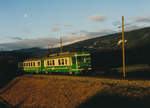 Transports de la région Morges-Bière-Cossonay, MBC/BAM.
Morgenstimmung bei Ballens an einem sehr kalten aber herrlichen  Morgen im Februar 1984.
Während sich am Himmel der Mond verabschiedet fährt der Regionalzug nach Morges mit dem Be 4/4 14  aus dem Schatten in die erste Morgensonne.
Foto: Walter Ruetsch
