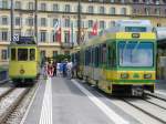 TN - Triebwagen Be 4/4 501 + Steuerwagen Bt 554 neben dem Olteimer Triebwagen Be 2/2  73 in Neuchtel am 10.06.2007