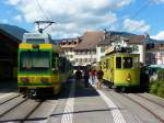 TN - In Boudry der ist Regelzug nach Neuchatel mit dem Be 4/4 506 und Steuerwagen Bt 554 neben dem Extrazug mit dem Oldtimer Tram Be 2/2 73 und Beiwagen C 1 ..