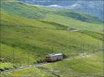 Dieser Triebzug der Jungfraubahn hat am 30.07.08 die Kleine Scheidegg (2061 m) verlassen und hat sich auf den beschwerlichen Weg  zum hchst gelegenen Bahnhof Europas, dem Jungfraujoch (3454 m) gemacht. (Hans)