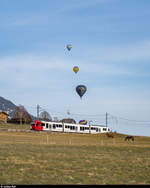 Festival International de Ballons de Château-d'Oex.<br>
Zu diesem Anlass werden die S51 Bulle - Montbovon der TPF am Wochenende bis Château-d'Oex verlängert. TPF ABe 4/12 105  L'armayi  am 25. Januar 2020 bei Château-d'Oex.