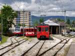 NStCM - Triebwagen ABe 4/8  403-404 und BDe 4/4 232 und BDe 4/4 211 mit Steuerwagen ABt 302 im Depotareal in Nyon am 06.05.2015