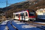 SCHATTENBILD   TRAVYS YVERDON Sainte-CROIX - BAHN YSteC  Baum Ast auf neuem Triebzug in Baumles bei winterlicher Stimmung vom 18.