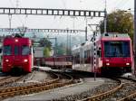 travys - Gterzug mit Triebwagen Be 4/4 1 neben ausfarendem Regio mit Triebwagen Be 2/6 2000 im Bahnhof von Yverdon les Bains am 24.09.2008