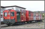 Bei der  grossen  SBB sind beide Fahrzeuge selten geworden, aber bei der Zentralbahn haben dieser Tm 172 598-5 und dieser Post/Gepckwagen
berlebt und stehen in  Stansstad. (22.10.2010)