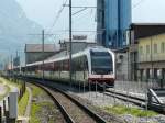 zb - Neue Triebzuge  ABe  150 201-8 (7 Teilig) und im Hitergrund der ABe  160 002-8 in einem Anschlussgeleise bei Meiringen am 11.09.2012 .. Standort des Fotografen bei einem Bahnbergang..