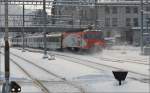Voralpenexpress bei der Ausfahrt aus St.Gallen. Die nur in wenigen Exemplaren gebaute BR 446 oder Re 4/4 IV der Sdostbahn ist der Sonderling am Ende des Zuges Richtung Luzern. Februar 2013.