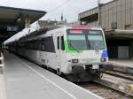 SOB - Triebwagen 561 082-9 vor dem Voralpenexpress im Bahnhof Rapperswil am 25.04.2015