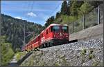 RE1728 mit Ge 4/4 II 628  S-chanf  bei Trin. (14.05.2019)