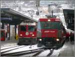 RE1216 nach Disentis/Mustr mit Ge 4/4 II 628  S-chanf  und Ge 4/4 III 642  Breil/Brigels  mit RE1125 nach St.Moritz stehen abfahrbereit in Chur.