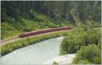 RE1245 mit Ge 4/4 II 615  Klosters  fhrt durch die Rheinschlucht bei Versam-Safien Richtung Chur. (04.07.2010)