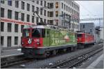 Ge 4/4 II 630  Trun  und Ge 6/6 II 703  St.Moritz  in Chur. (19.12.2012)