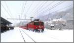 RE1241 mit Ge 4/4 II 624  Celerina/Schlarigna  fhrt im verschneiten Ilanz ein.