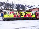 Ge 4/4 II 611 mit Werbung  Login  im Bf. Pontresina - 07/02/2013