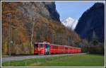 RE1240 mit Ge 4/4 II 615  Klosters   mit der Chlus und dem Chenihorn 2413m im Hintergrund. (29.11.2013)