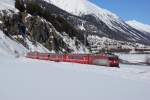 Ge 4/4 II 633 zieht am 09.03.2014 einen Extrazug von Samedan Richtung st. Moritz, aufgenommen bei Celerina.