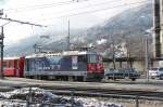 Werbelok  100 Jahre Chur-Arosa  vor einem Zug nach Davos am 18.01.15 in Landquart.