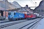 R1932 mit Ge 4/4 II 619  Samedan  und Ge 6/6 II 703  St.Moritz in Pontresina. (22.12.2016)
