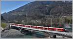 Ge 4/4 III 648  Susch  mit IR1153 nach St.Moritz auf der Hinterrheinbrücke in Reichenau-Tamins.