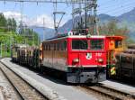 RhB - Ge 6/6  707 mit Güterzug bei der einfahrt im Bahnhof von Thusis am 07.05.2015