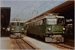 Die RhB Ge 4/4 I 601 und Ge 6/6 II 706 warten gem. meinen Aufzeichnungen mit Regional- und Schnellzügen Richtung Albula am 20. August 1984 in Chur auf die Abfahrt.
