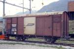 RhB - Gbk 5721 am 30.05.1992 in Samedan - gedeckter Gterwagen 2-achsig mit 1 offenen Plattform - PAPIERLAGER DISENTIS - Baujahr 1903 - BASEL - Gewicht 7,12 - Zuladung 12,50t - LP 8,45m - zulssige