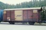 RhB - Gbk 5802 am 27.05.1990 in St.Moritz - gedeckter Gterwagen 2-achsig mit 1 offenen Plattform - Baujahr 1911 - SIG - Gewicht 7,20 - Zuladung 15,00t - LP 8,54m - zulssige Geschwindigkeit 65 km/h