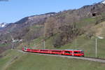 RE 1335 (Landquart-St.Moritz) mit Schublok 614 bei Saas 31.3.19