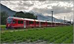 IR1152 mit Ait 57802 und mit Ge 4/4 III 647  Grüsch  bei Felsberg.