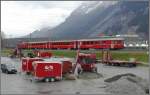 R 1551 nach Thusis mit Ge 4/4 I 607  Surselva  und Steuerwagen 1721 hat soeben Chur West verlassen. (02.04.2008)