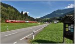 RE1048 von Davos Platz nach Landquart bei Jenaz. Steuerwagen 1755 führt den Zug, die Lok Ge 4/4 III 649  Lavin  befindet sich in Zugsmitte. (02.09.2016)
